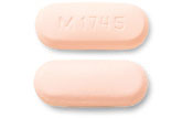 Pill M 1745 Orange Oval is Ciprofloxacin Hydrochloride Extended Release