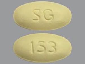 Pill SG 153 Yellow Oval is Atorvastatin Calcium