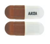 Pill AA12A Brown & White Capsule/Oblong is Thiothixene
