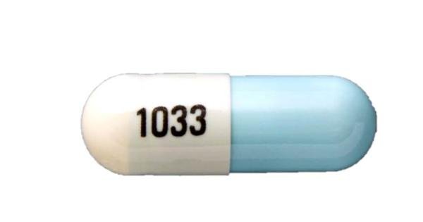 Pill 1033 Blue & White Capsule/Oblong is Lenalidomide