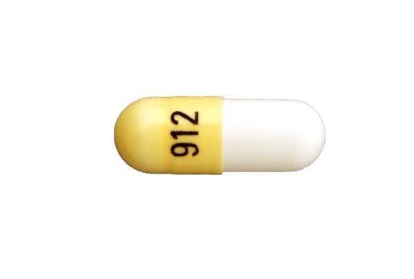 Pill 912 Yellow & White Capsule/Oblong is Fingolimod Hydrochloride