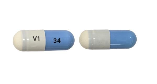Pill V1 34 Blue & White Capsule/Oblong is Mexiletine Hydrochloride