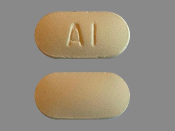 Pill AI Yellow Capsule/Oblong is Acetaminophen and Ibuprofen