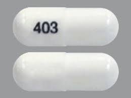 Pill 403 White Capsule/Oblong is Coxanto