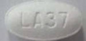 Pill LA37 White Oval is Atorvastatin Calcium