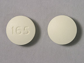 Pill 165 Beige Round is Flurbiprofen