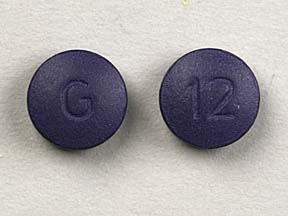 Pill G 12 Purple Round is Dipyridamole