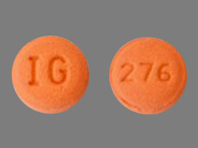 Pill IG 276 Tan Round is Hydroxyzine Hydrochloride