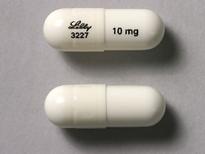 Pill Lilly 3227 10 mg White Capsule/Oblong is Atomoxetine Hydrochloride