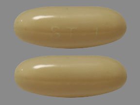 Pill ST-l White Capsule/Oblong is Valproic Acid