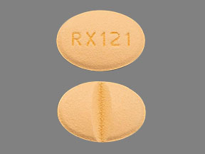 Pill RX121 Yellow Oval is Valsartan