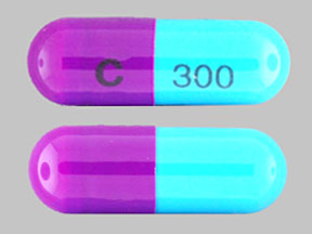 Pill C 300 Purple Capsule/Oblong is Cefdinir