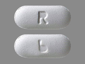 Pill R 6 White Capsule/Oblong is Quetiapine Fumarate