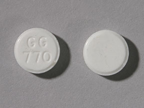 Pill GG 770 White Round is Lovastatin