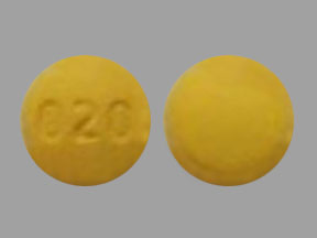 Pill 020 Yellow Round is Cyclobenzaprine Hydrochloride