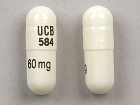 Pill UCB 584 60 mg White Capsule/Oblong is Metadate CD