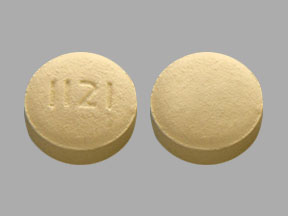 Pill 1121 White Round is Doxycycline Monohydrate