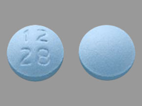 Pill 12 28 Blue Round is Amitriptyline Hydrochloride