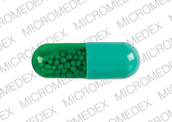 Pill Lederle M46 Lederle 100 mg Green Capsule/Oblong is Minocin