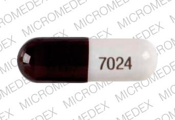 Pill 0115 7024 Brown & White Capsule/Oblong is Lipram-CR20