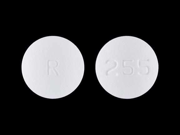 Pill R 255 White Round is Carvedilol