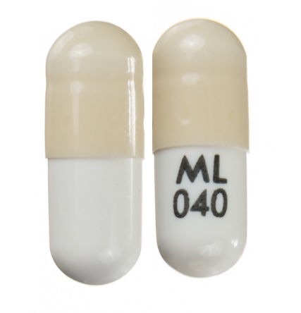 Pill ML 040 White & Yellow Capsule/Oblong is Doxycycline Monohydrate