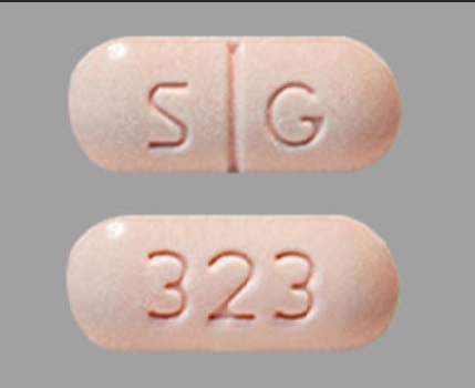 Pill S G 323 Pink Capsule/Oblong is Metaxalone