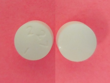 Pill 227 1 White Round is Paroxetine Hydrochloride Extended Release