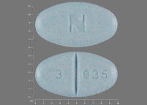 Pill 3 035 N Blue Oval is Glyburide (Micronized)