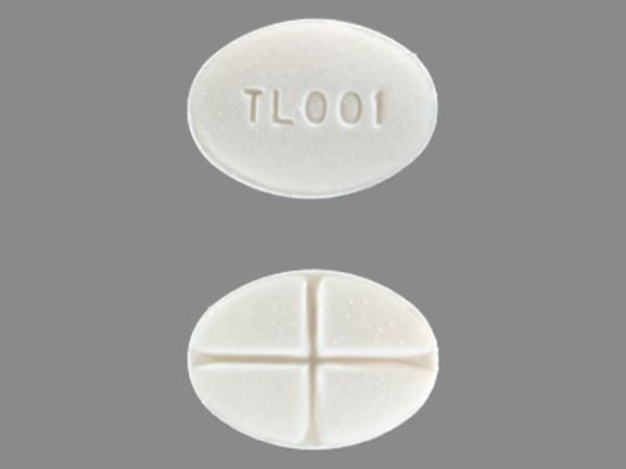 Pill TL 001 White Oval is Methylprednisolone