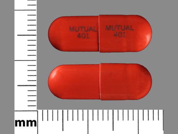 Pill MUTUAL 401 MUTUAL 401 Orange Capsule/Oblong is Trimethobenzamide Hydrochloride